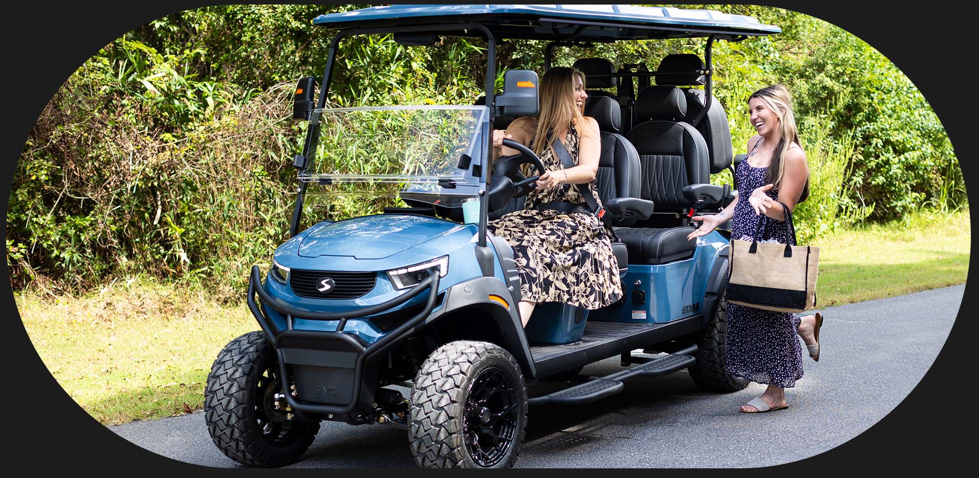 woman driving the sivo 6 seater lifted golf cart